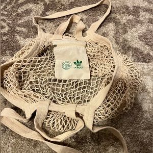 Adidas Reusable Cotton Mesh Grocery Bag with zip pocket for coins is new.